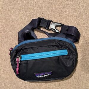 Patagonia Black Belt Bag with Blue Zipper